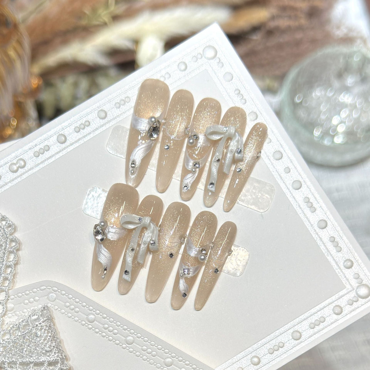 Elegant Decorative Press-On Nail Set with Rhinestone Accents — product view 3