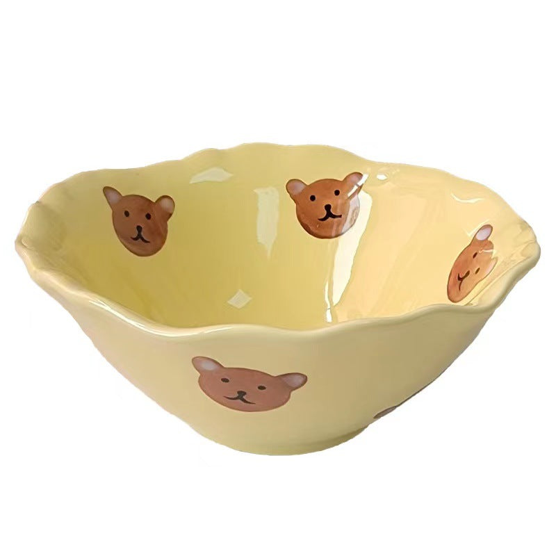 Decorative hand-painted ceramic bowl with wavy edge and tulip design — product view 5