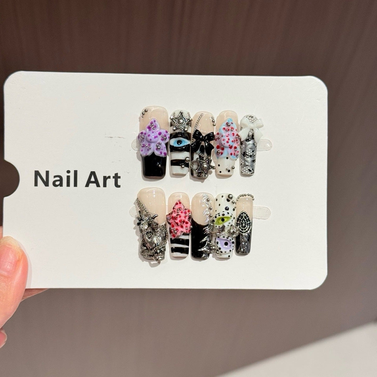 Artistic Press-On Nail Set with Unique Design Elements — product view 4