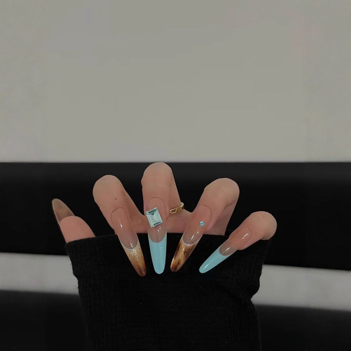 Elegant Stiletto Nail Extensions with Glitter Accents — product view 3