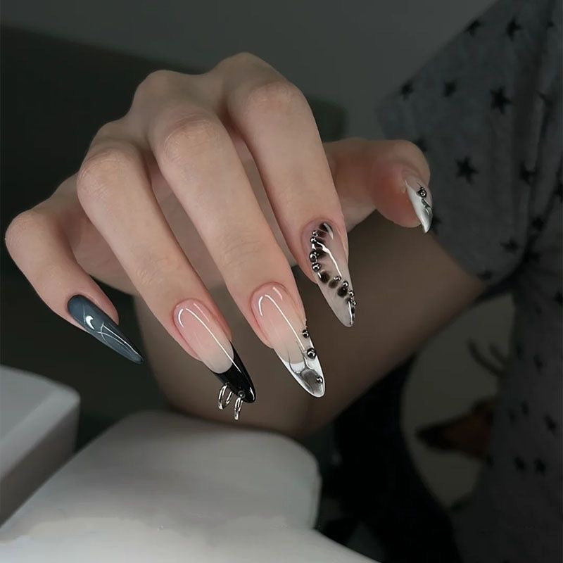 Artistic Oversized Stiletto Nail Enhancements — product view 6
