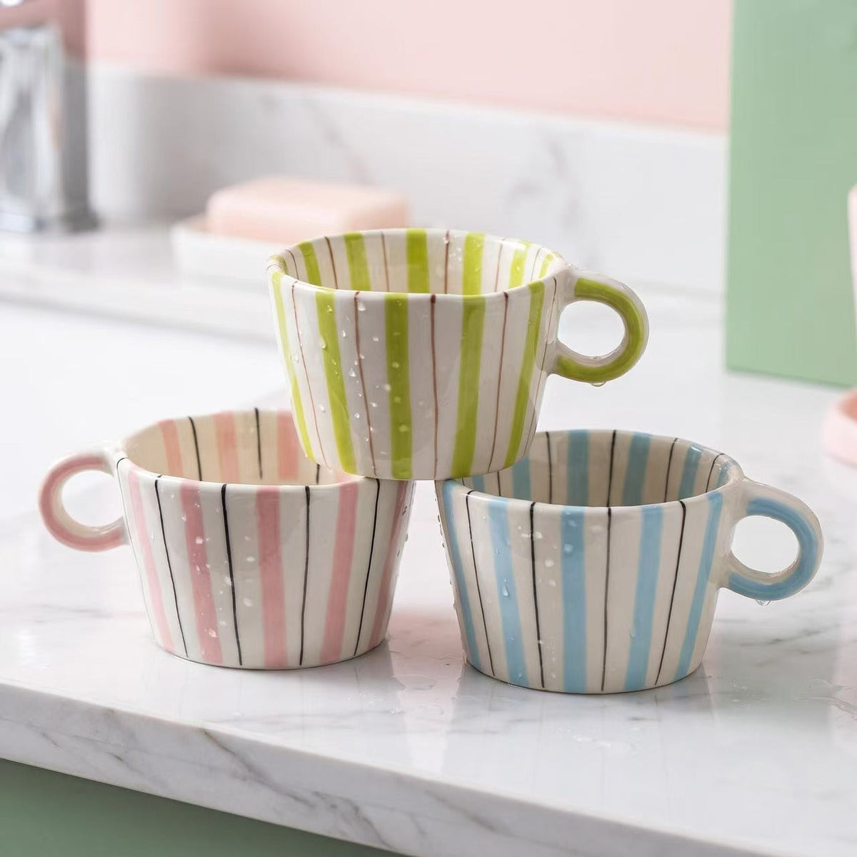 Ceramic coffee mug with ergonomic round handle and fine striped texture — product view 2