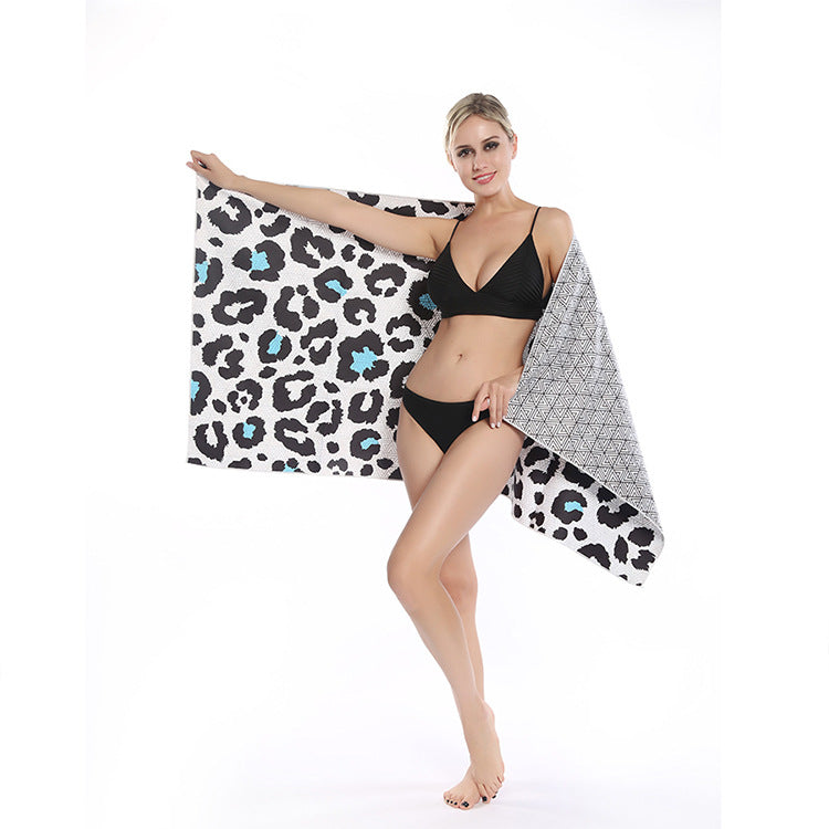 Beach towel with striking leopard motif and colorful accents LoungeYard — product view 2