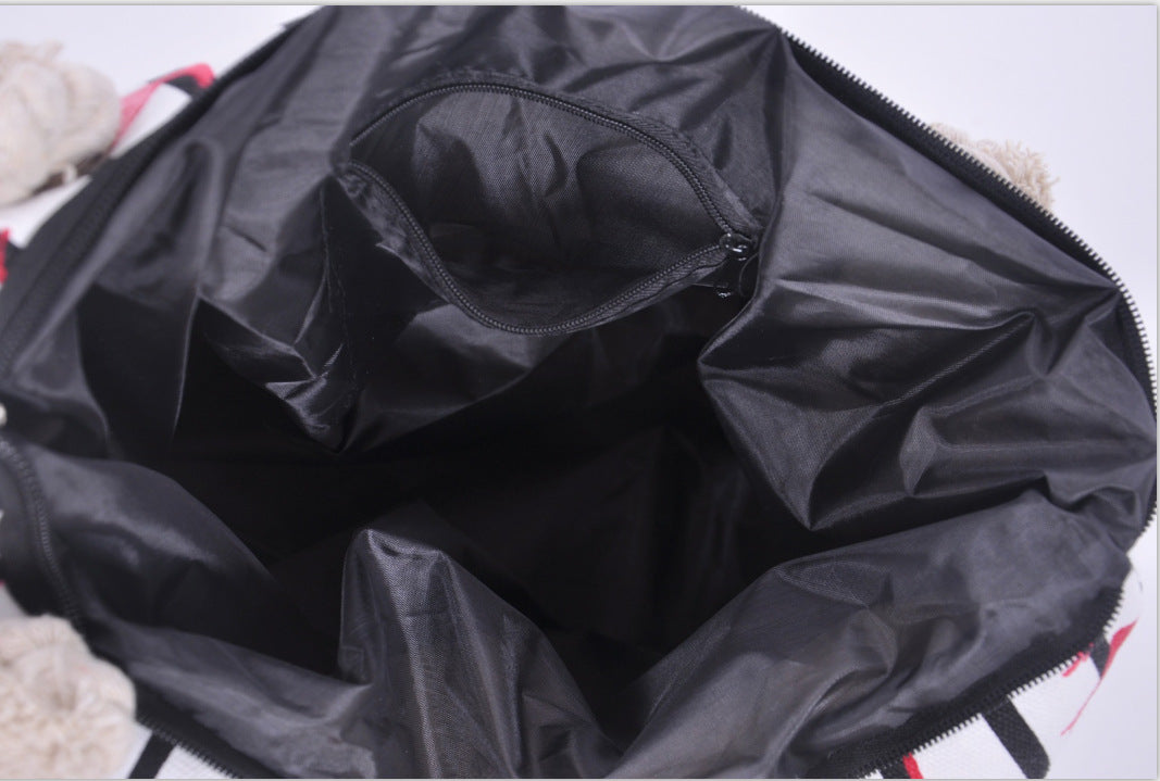 Beach bag with floral motifs and sturdy rope handles LoungeYard — product view 2