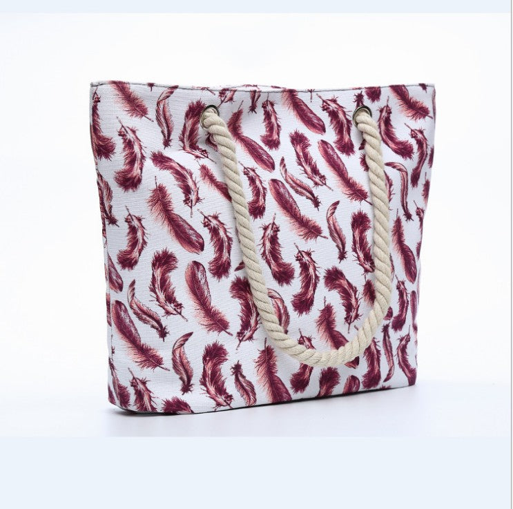 Beach bag with playful feather pattern LoungeYard — product view 2