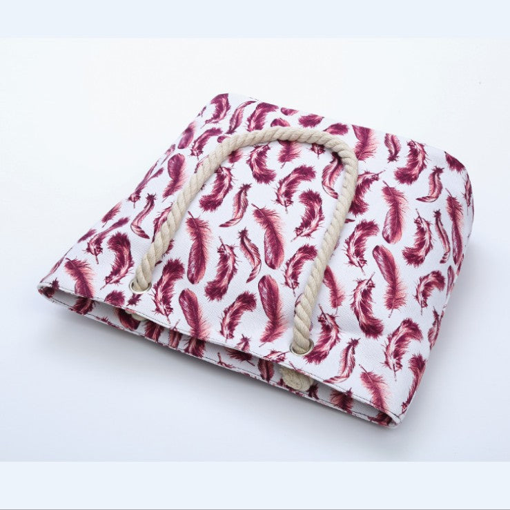 Beach bag with playful feather pattern LoungeYard — product view 3