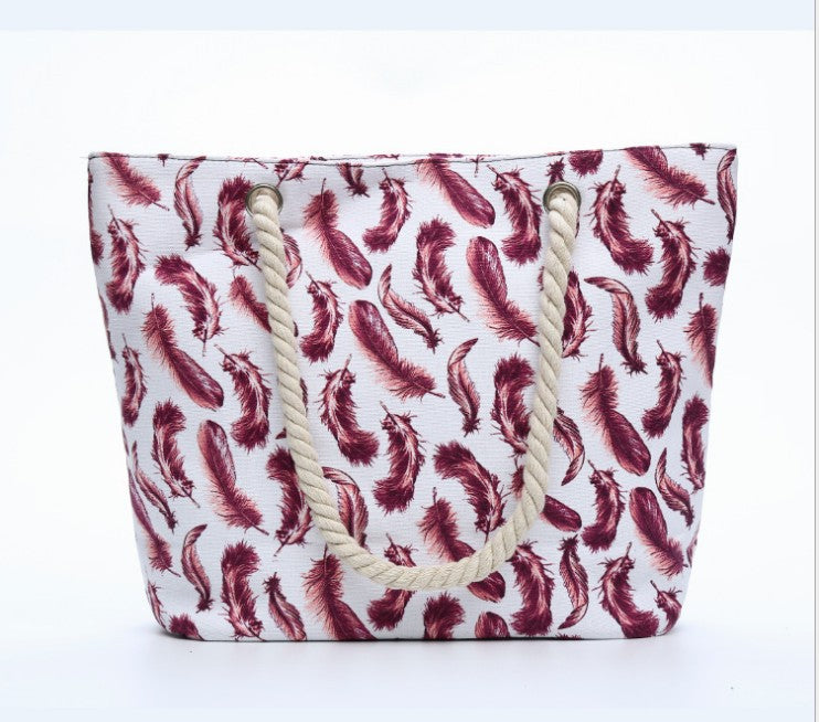 Beach bag with playful feather pattern LoungeYard — product view 1