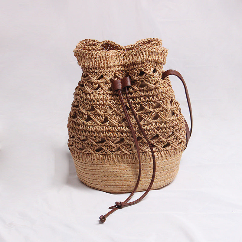 Handmade straw bag with leather accents LoungeYard — product view 2
