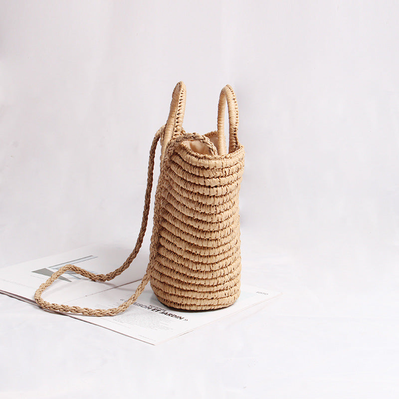Handmade basket bag with round handle and removable shoulder strap LoungeYard — product view 3