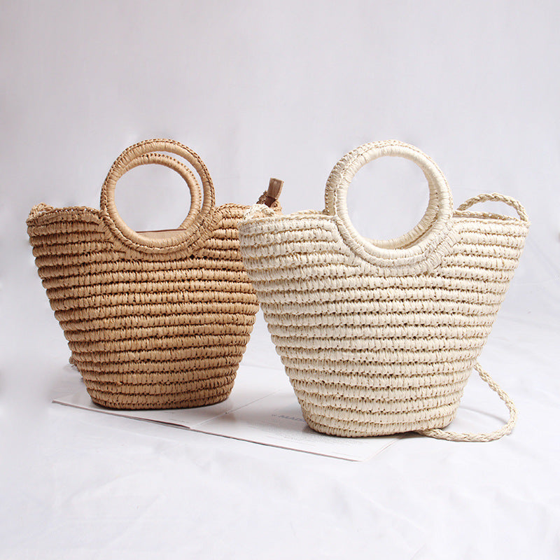 Handmade basket bag with round handle and removable shoulder strap LoungeYard — product view 1