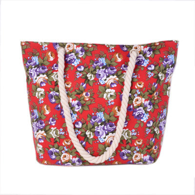 Beach bag with sturdy rope handles and floral details LoungeYard — product view 3