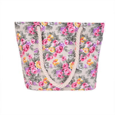 Beach bag with sturdy rope handles and floral details LoungeYard — product view 1