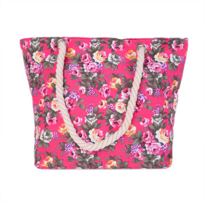 Beach bag with sturdy rope handles and floral details LoungeYard — product view 2