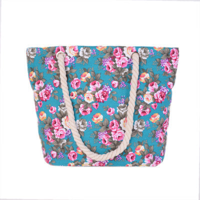 Beach bag with sturdy rope handles and floral details LoungeYard — product view 4