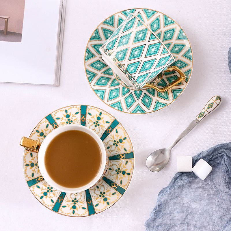 Elegant porcelain coffee cup set with saucers, spoons and delicate ornamental decoration — product view 3