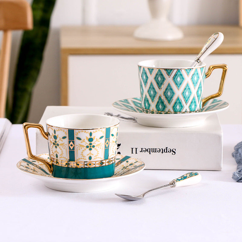 Elegant porcelain coffee cup set with saucers, spoons and delicate ornamental decoration — product view 1