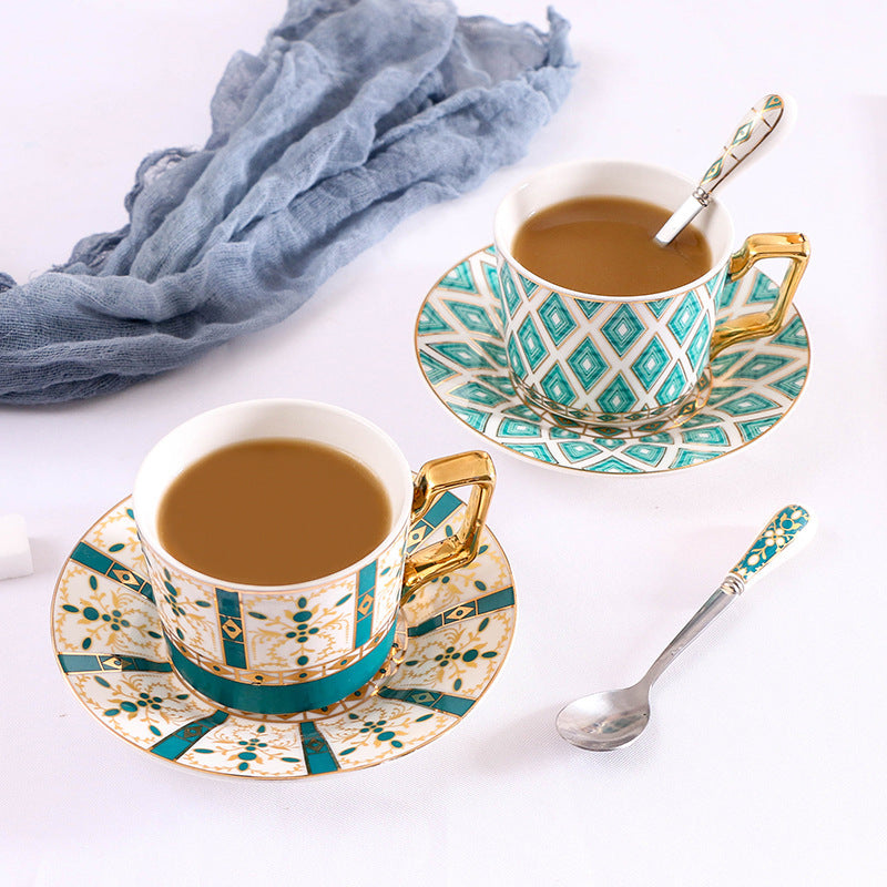 Elegant porcelain coffee cup set with saucers, spoons and delicate ornamental decoration — product view 2