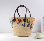 Braided beach bag with colorful embroidery pattern LoungeYard