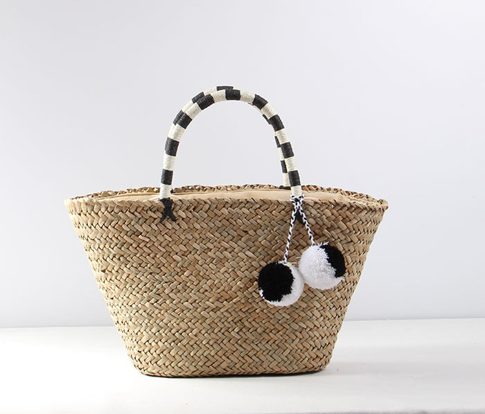 Braided beach bag with decorative pompons LoungeYard — product view 6