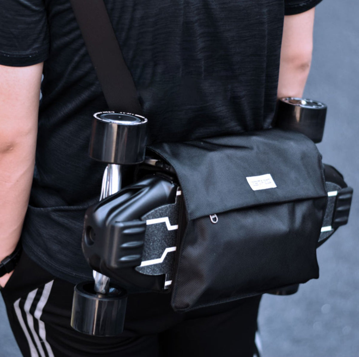 LoungeYard | 2-in-1 Backpack for Carrying The Complete Longboard, Skateboard or Surf Skate, with Large Capacity, Adjustable Strap, Stress Relief Ergonomic Design — product view 1