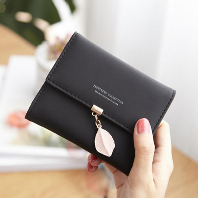 Short wallet with three folds and leaf decor | LoungeYard — product view 1