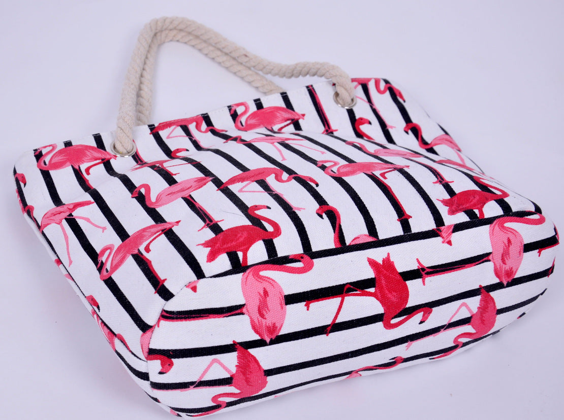 Beach bag with flamingo pattern and sturdy rope handles LoungeYard — product view 2