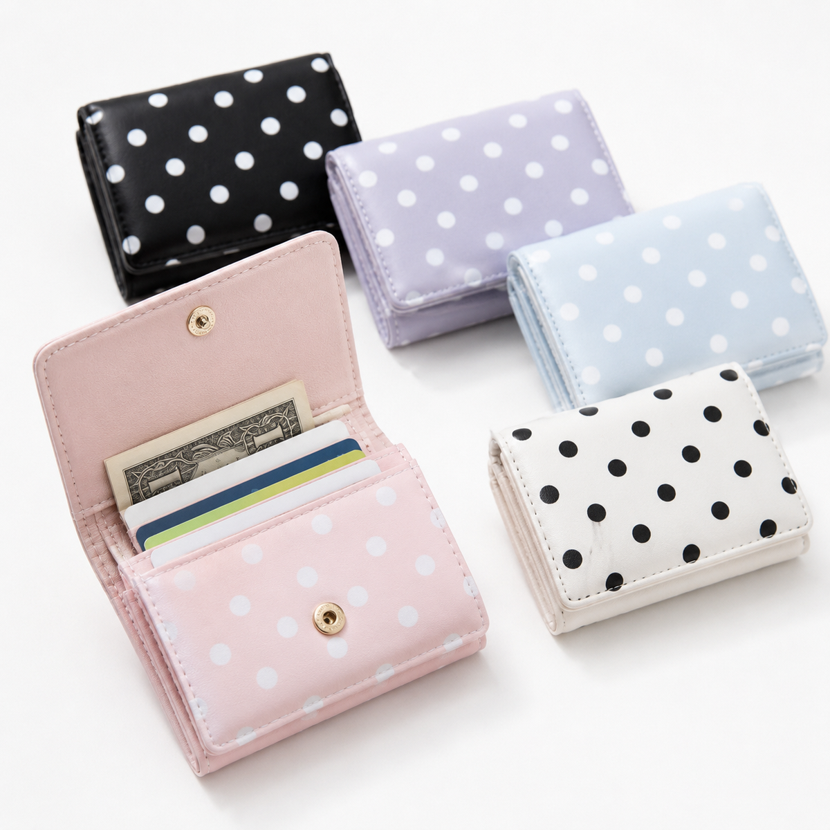 Compact polka dot trifold wallet with RFID protection multiple card and coin compartments LoungeYard — product view 1