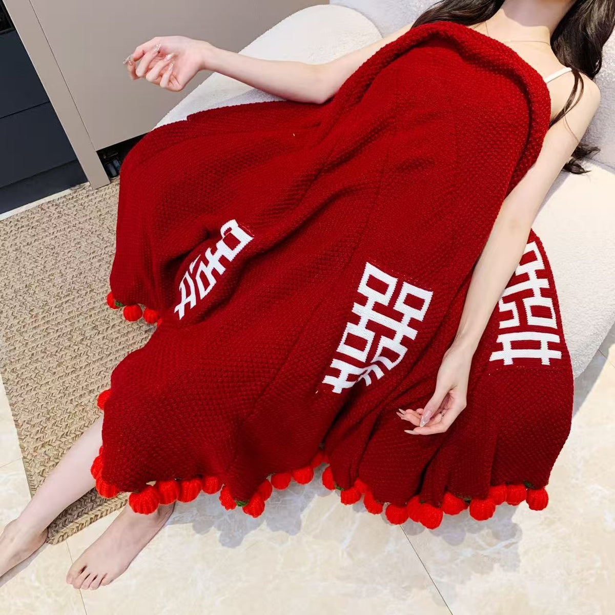Snuggle blanket with decorative pompom fringes LoungeYard — product view 1