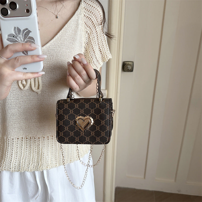 Elegant Heart-Embellished Handbag — product view 1