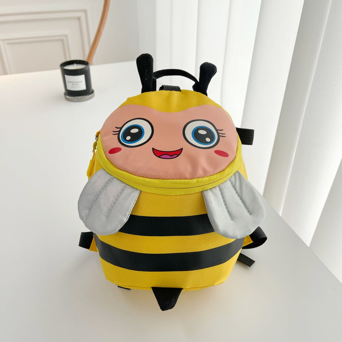 Plush backpack with bee motif and practical compartments LoungeYard — product view 1