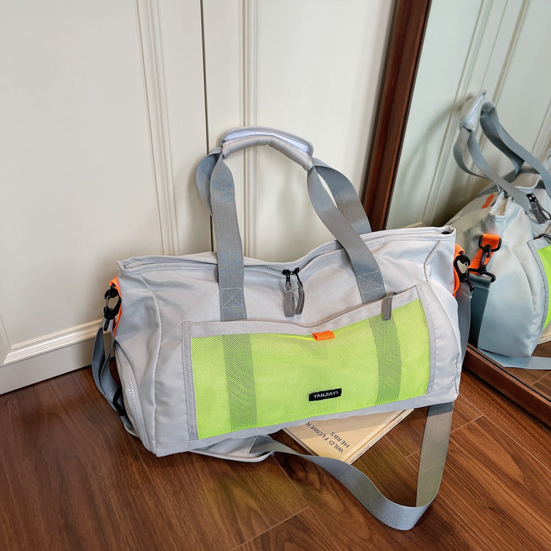 Sporty travel bag with mesh structure and practical compartments LoungeYard — product view 1