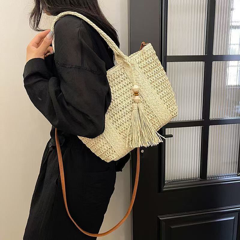 Braided tote bag with tassels and leather details LoungeYard — product view 1