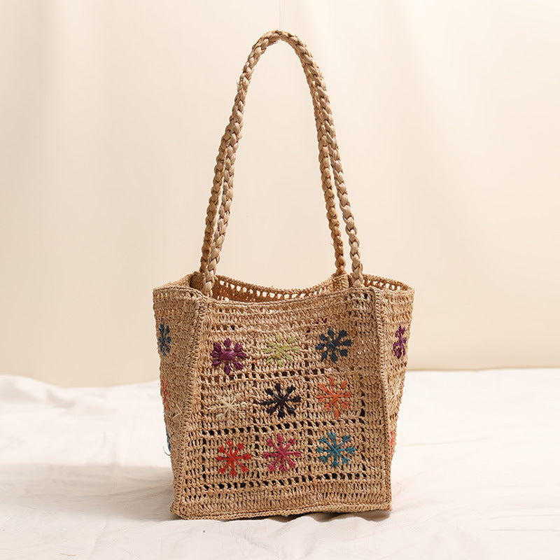 Handcrafted straw bag with colorful embroidery design LoungeYard — product view 6