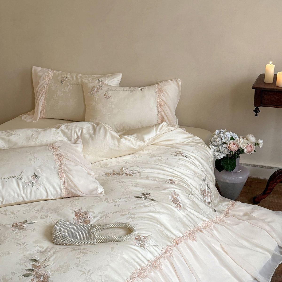 Romantic satin bedding set with embroidered floral design, ruffle and pillowcases — product view 3
