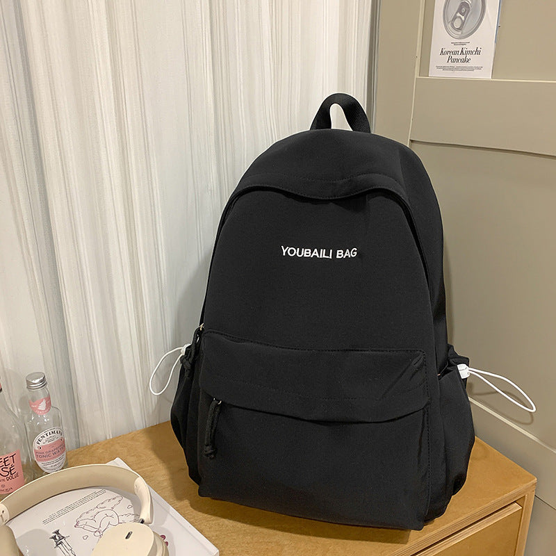 Lightweight Casual Backpack with Decorative Keychain LoungeYard — product view 7