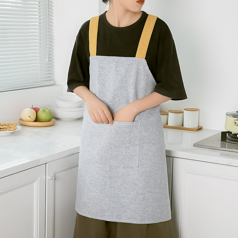 Apron with cross straps and large front pocket made of linen blend — product view 2