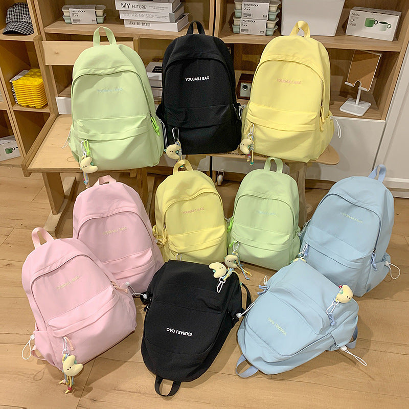 Lightweight Casual Backpack with Decorative Keychain LoungeYard — product view 4
