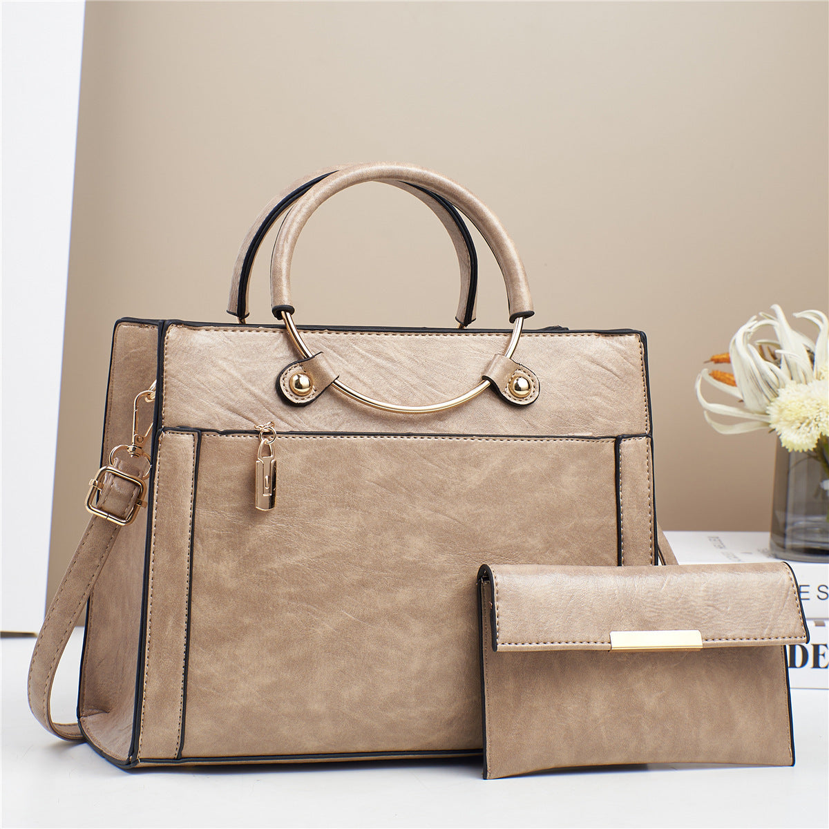 Elegant handbag with detachable shoulder strap and matching wallet LoungeYard — product view 7
