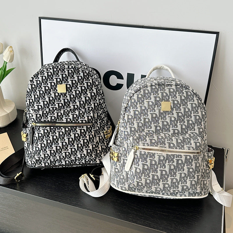 Signature Monogram Backpack — product view 1