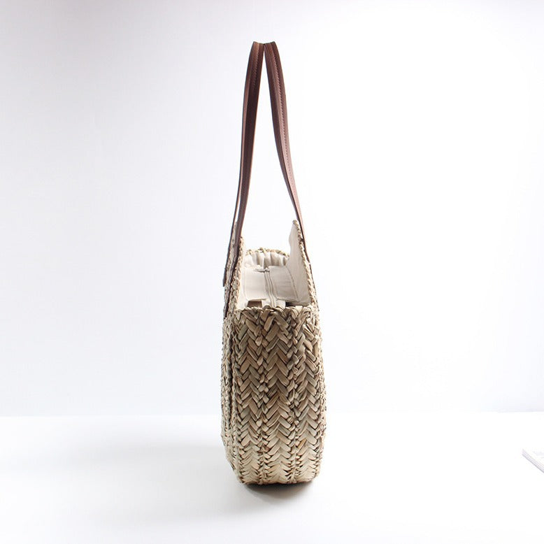 Braided straw beach bag with elegant leather handles LoungeYard — product view 4