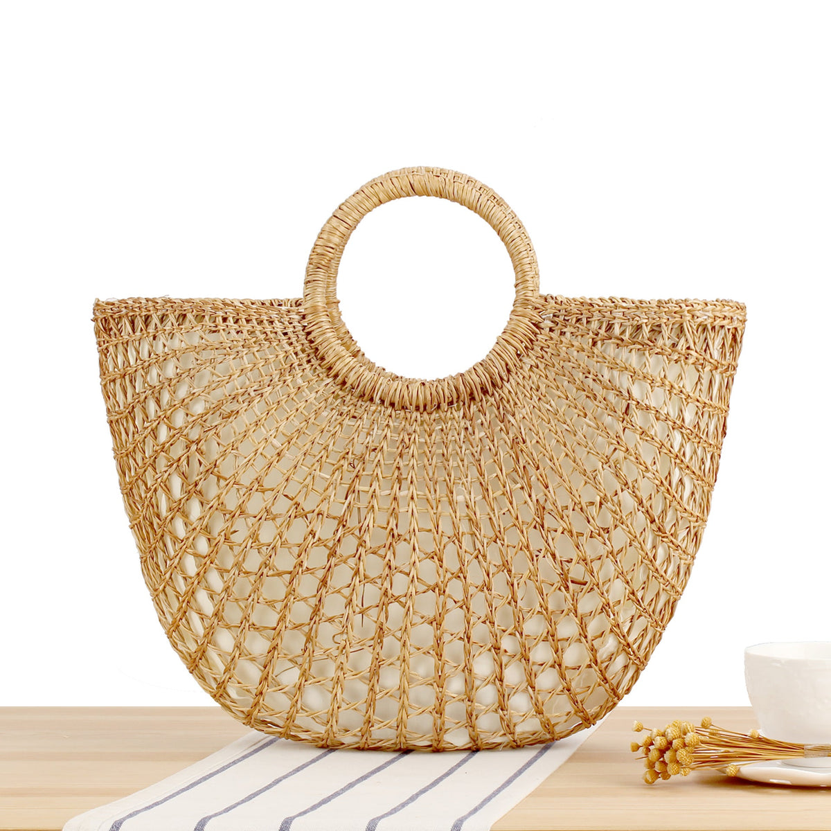 Braided basket bag with stylish round handle LoungeYard — product view 1