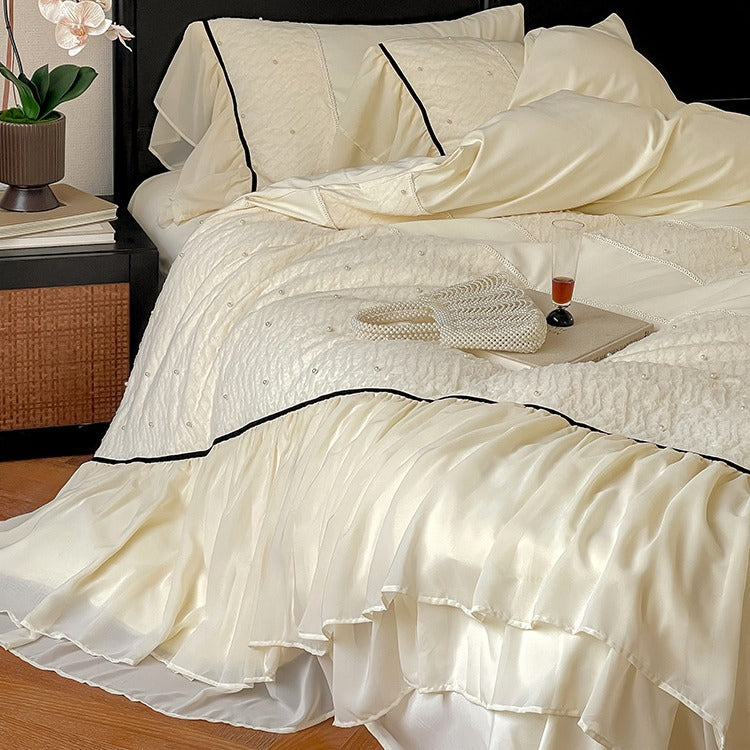 Luxurious bedding set with chiffon ruffles, comforter and contrast piping — product view 1