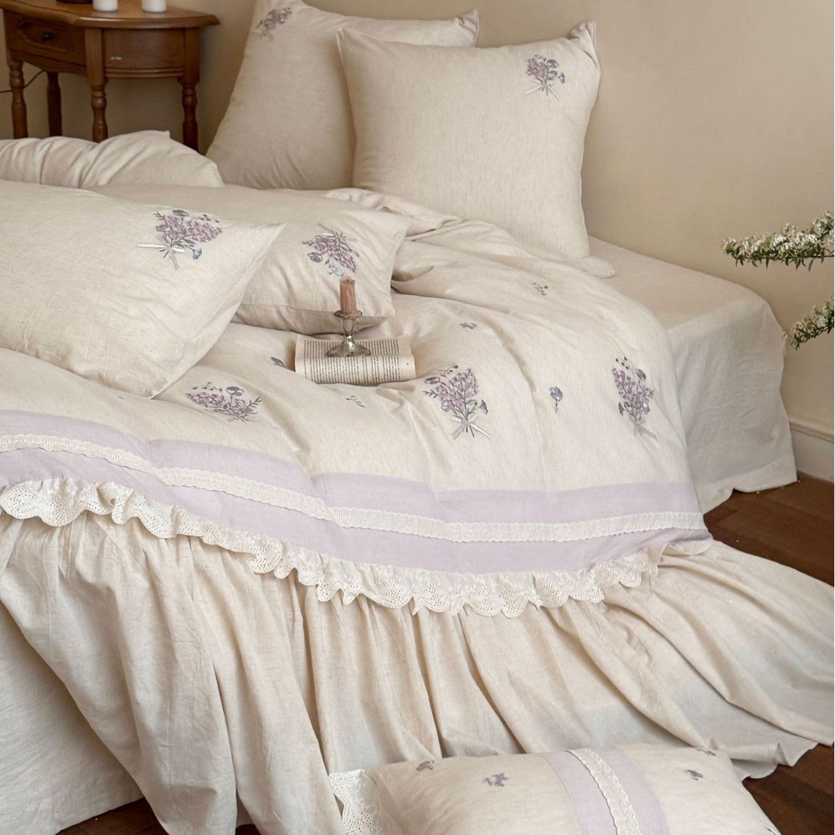 Vintage-inspired bedding set with ruffled bed skirt and delicate floral embroidery — product view 3