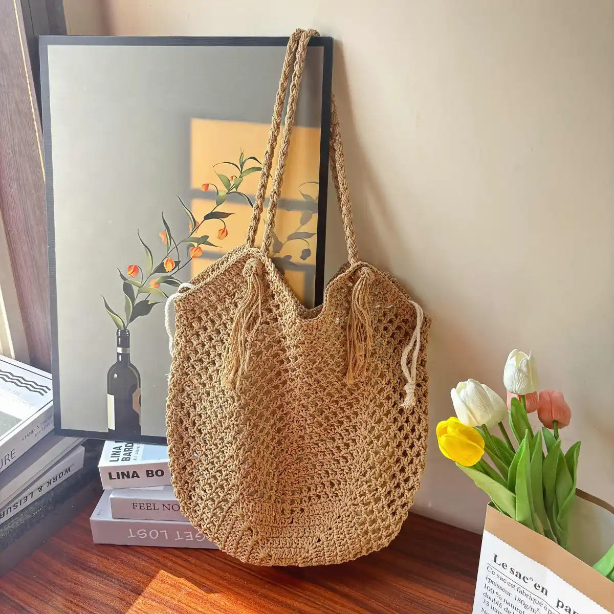 Handcrafted straw bag with tassels LoungeYard — product view 1