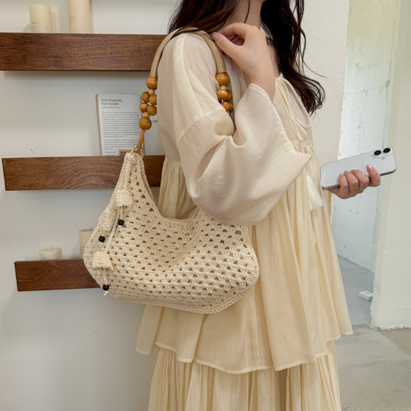 Handmade crochet bag with colorful tassels LoungeYard — product view 1