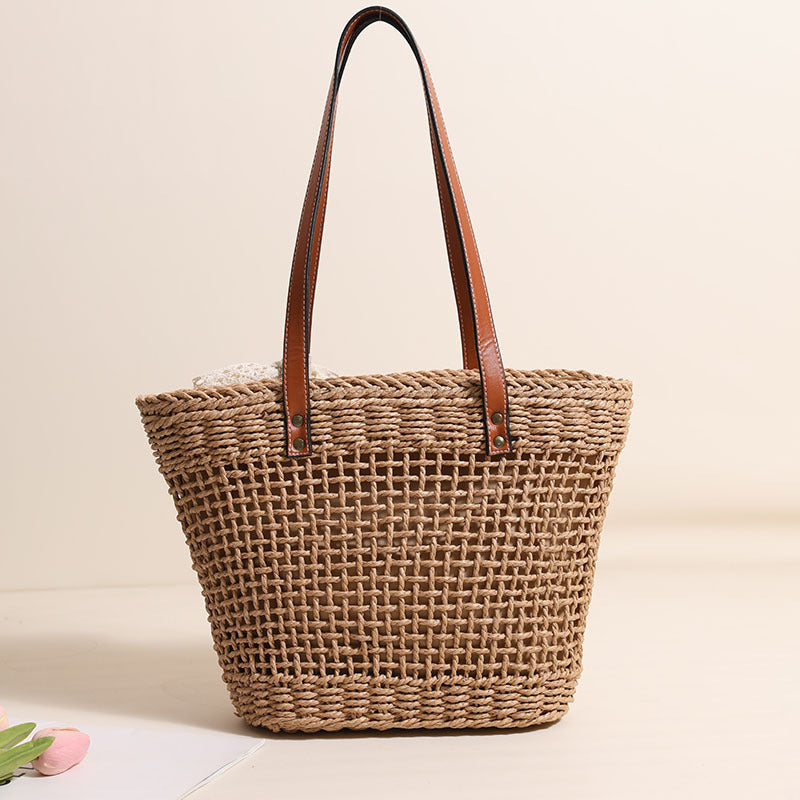 Handmade straw bag with elegant leather accents LoungeYard — product view 3