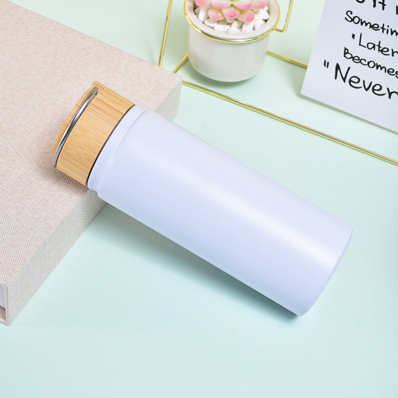 Ladies stylish and versatile stainless steel drinking bottle with bamboo lid LoungeYard — product view 4