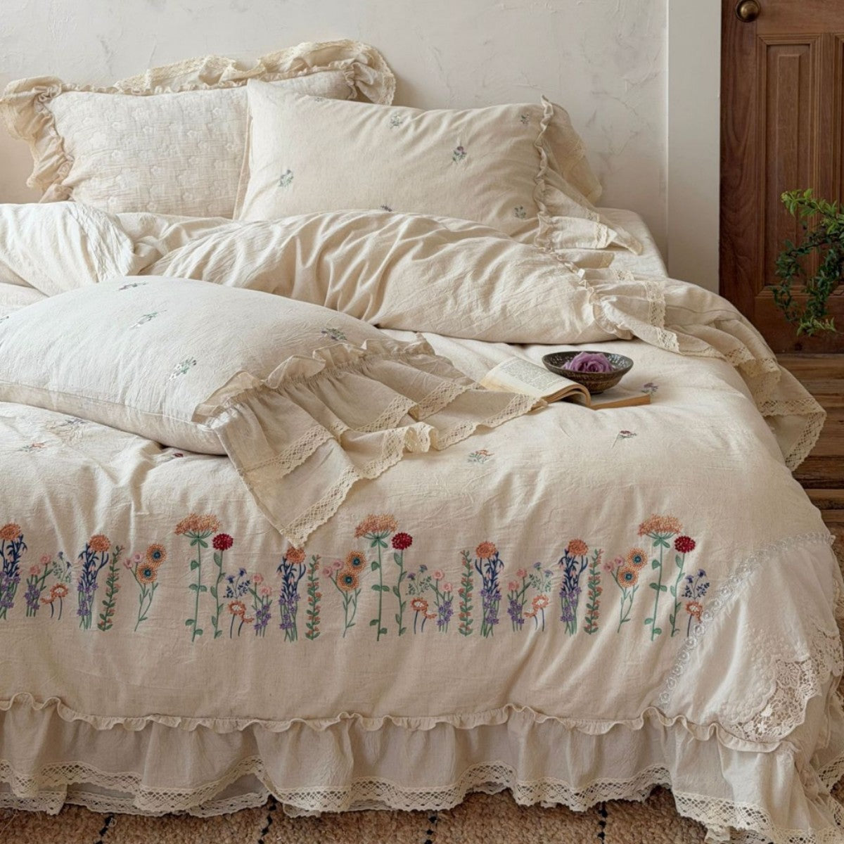 Romantic linen-cotton bedding set with embroidered floral border and ruffle — product view 2