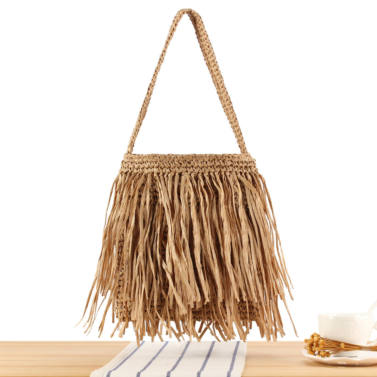 Braided summer handbag with fringed design LoungeYard — product view 1