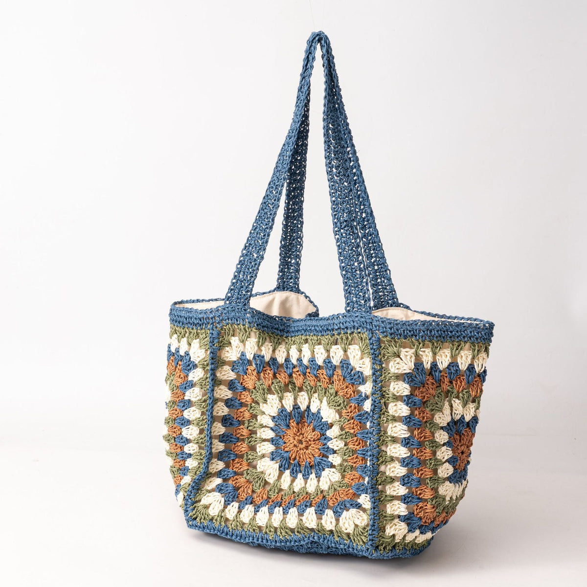 Beach bag made of hand-woven natural material with a square pattern LoungeYard — product view 6